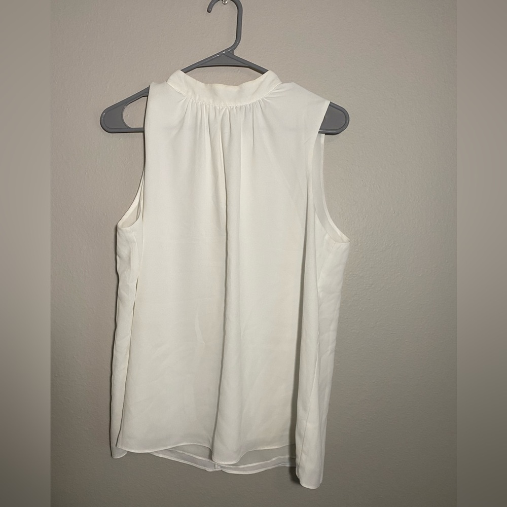 Forever 21 white top with ribbon to bow on the back